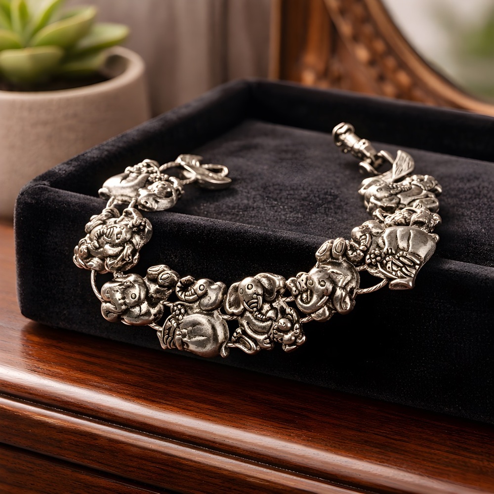 Silver Toned Metal Elephant Bracelet - Picture 1 of 6